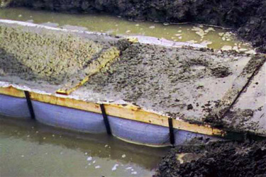 Fab-Form Fastfoot Prevents Ground Water Contamination, Fabric Formwork for concrete footings and pad edging in MA